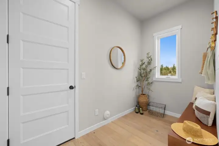 Mudroom off entry with garage access.
