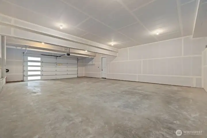 Spacious four car garage.