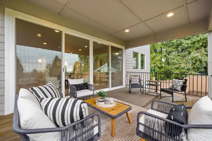 Covered deck on main level off dining.