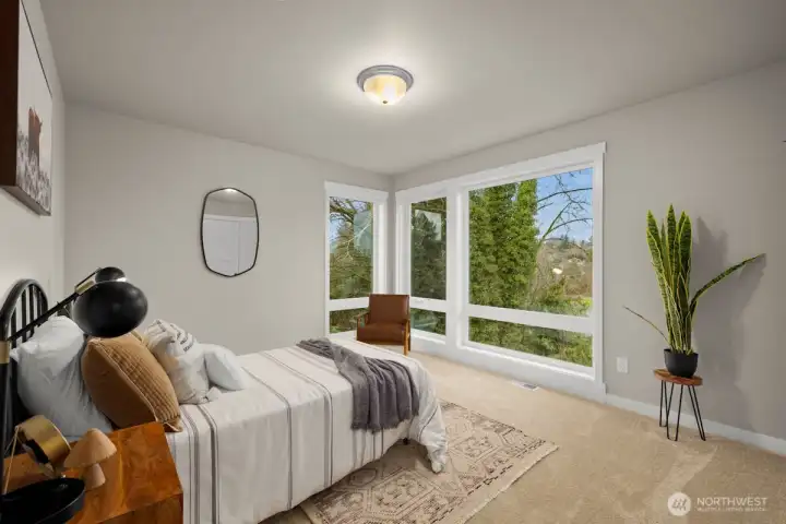 Upper level bedroom shared full bath.