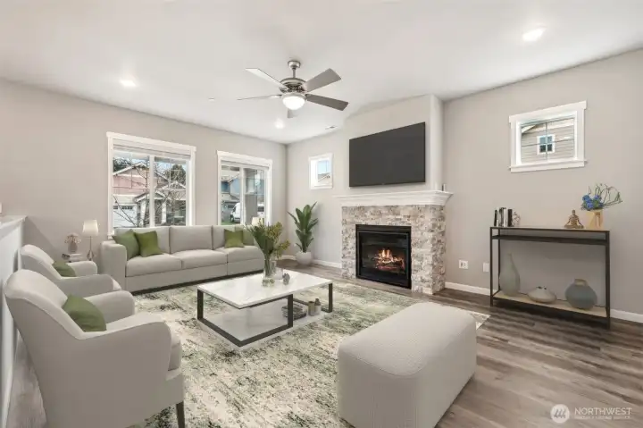 Living room with lots of natural light and fireplace