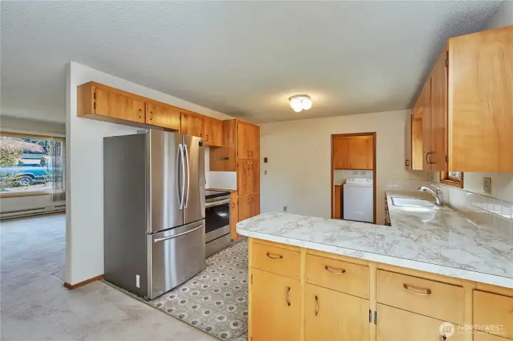 Kitchen With Laundry Room To The Back