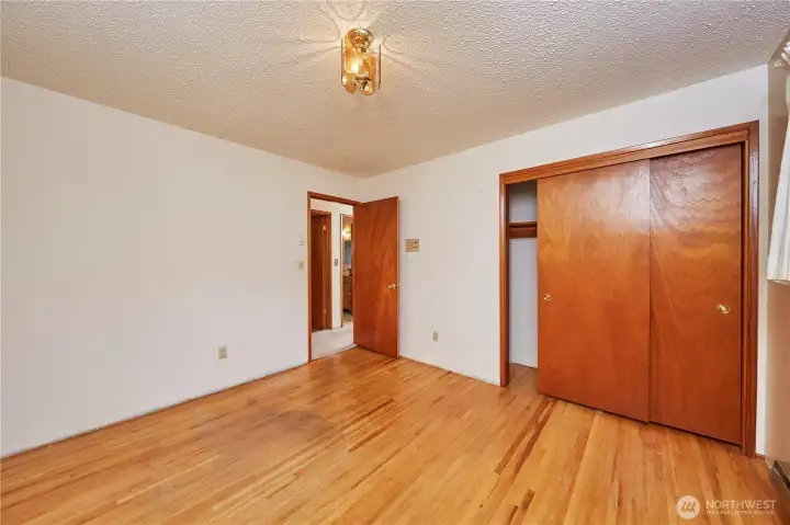 Third Bedroom With Hardwood Floor And Double Closet