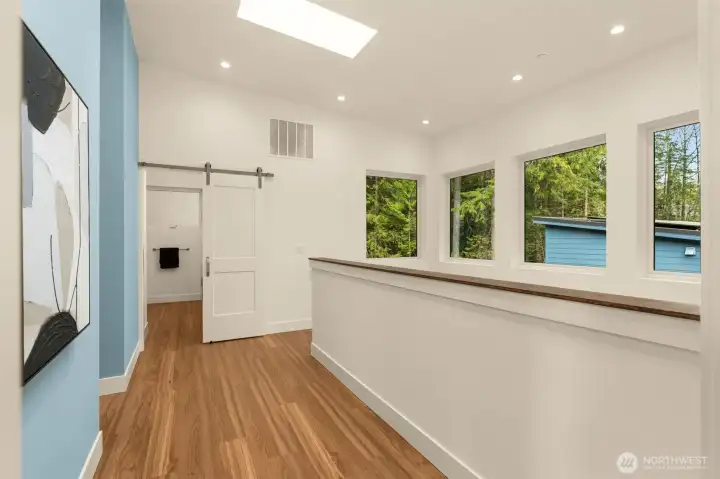 Up stairs Hallway with sky lights/windows galore!