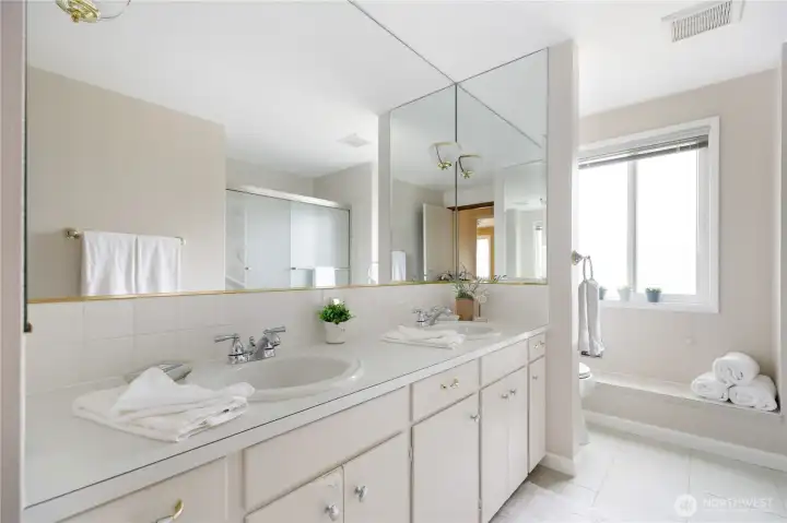 Main bathroom with double sinks and tile floor Main bathroom with double sinks and tile floor