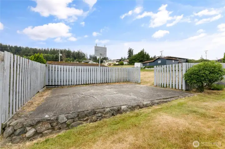 Basket ball area on side of home. Fence opening leads to 2nd lot Basket ball area on side of home. Fence opening leads to 2nd lot