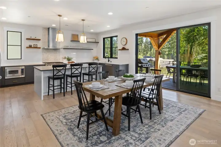 Elegant dining connection within the open-concept main level. Elegant dining connection within the open-concept main level.