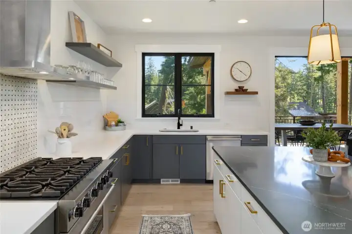 Clean modern cabinetry with timeless finishes and generous counter space for meal preparation. Clean modern cabinetry with timeless finishes and generous counter space for meal preparation.