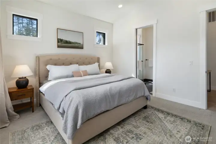 Another view of the primary bedroom; a quiet and restful retreat within the main level. Another view of the primary bedroom; a quiet and restful retreat within the main level.