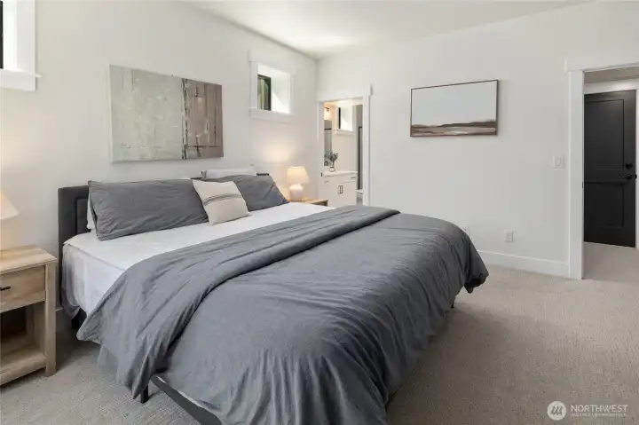 Another view of the lower level bedroom with its own private bath. Another view of the lower level bedroom with its own private bath.