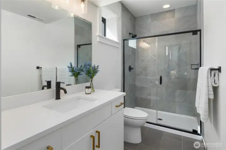 Private bath with lower level bedroom. Private bath with lower level bedroom.
