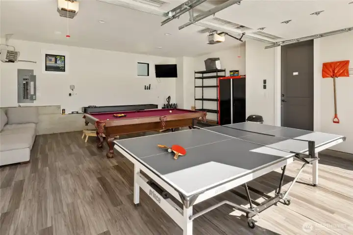 Garage converted into a fully functional game space. Garage converted into a fully functional game space.
