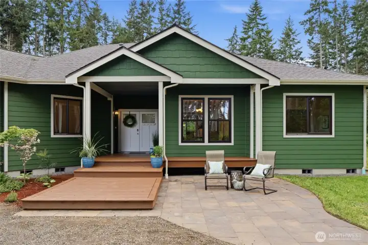 Welcoming covered front porch and patio