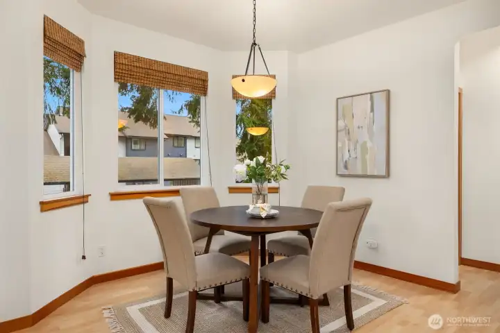 A spacious dining area features a bay window which adds to the charm of this home.