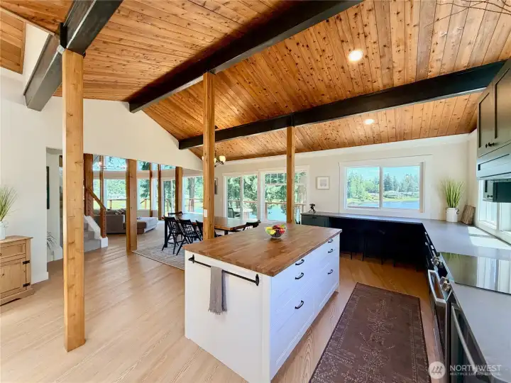 The open layout of the main kitchen connects seamlessly to the dining area and great room while lake views pour in through every window. The iconic A-frame silhouette makes this space feel as good as it looks.