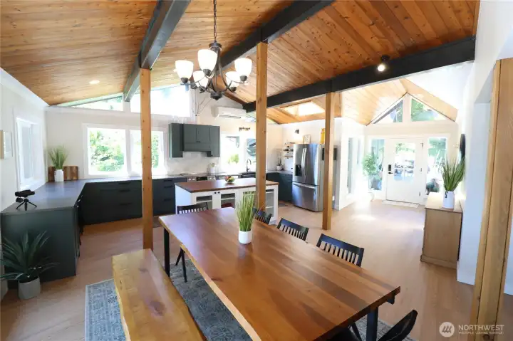 Soaring A-frame ceilings, gorgeous wood beams, an open island kitchen, and a dramatic entryway, this is the home that takes your breath away the moment you walk in.
