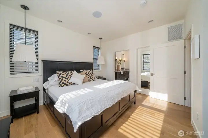 Main level ADA friendly Primary Bedroom suite.