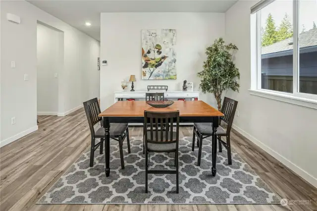 The dining area can fit a large table for entertaining.