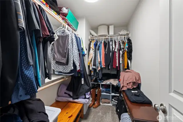 Primary bedroom walk-in closet