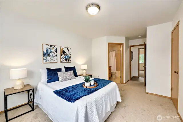 Primary bedroom w/bath ensuite and WI closet.