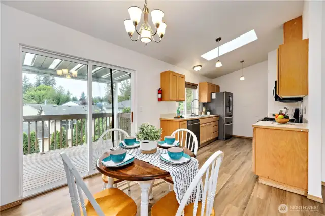 Dining area, slider to spacious deck and back yard.