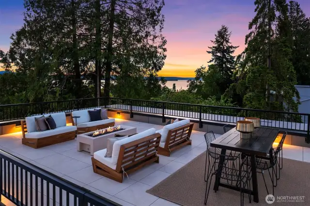Private western facing rooftop deck with lake and mountain views