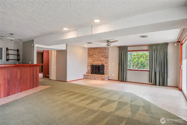 Family room with 2nd woodburning fireplace
