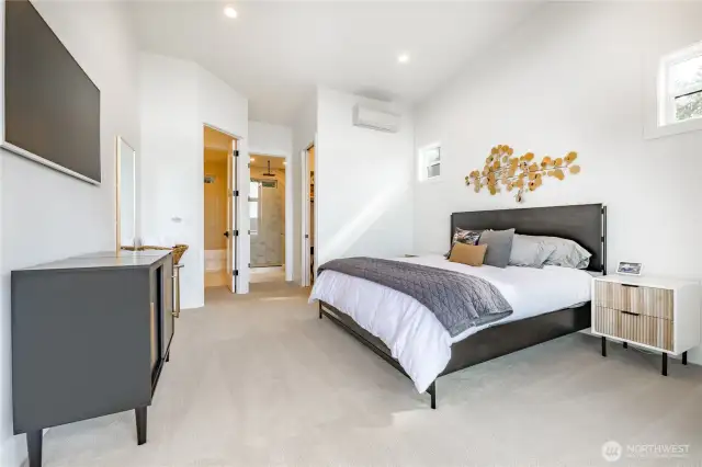 Primary bedroom with en suite bathroom.