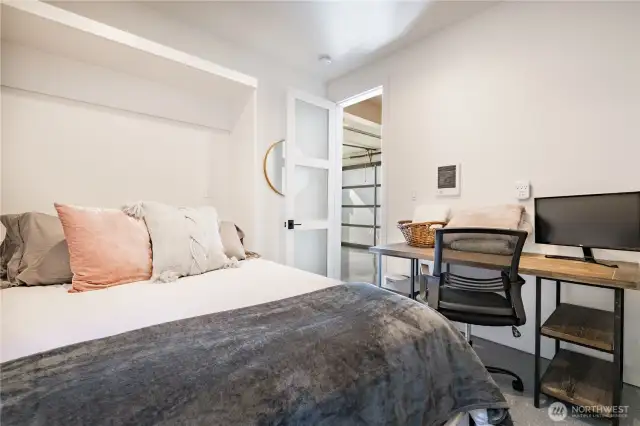 Lower level flex room is currently used as a non-conforming bedroom and office space.