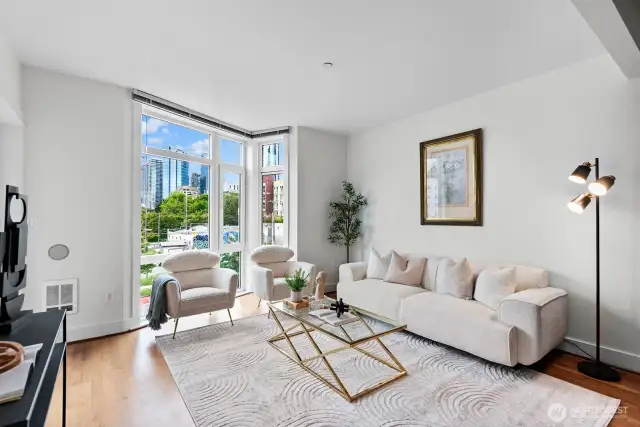 Floor-to-ceiling windows in the living room to check out the city.