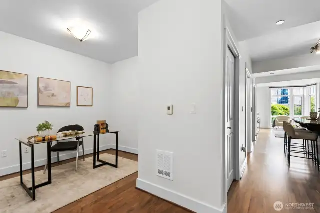 The den is an excellent space for an office, nursery, media room, or reading nook.
