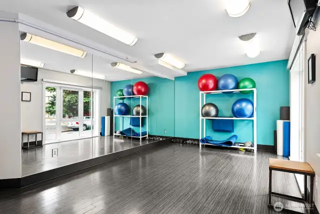 The yoga studio is located on floor 1, adjacent to the gym.