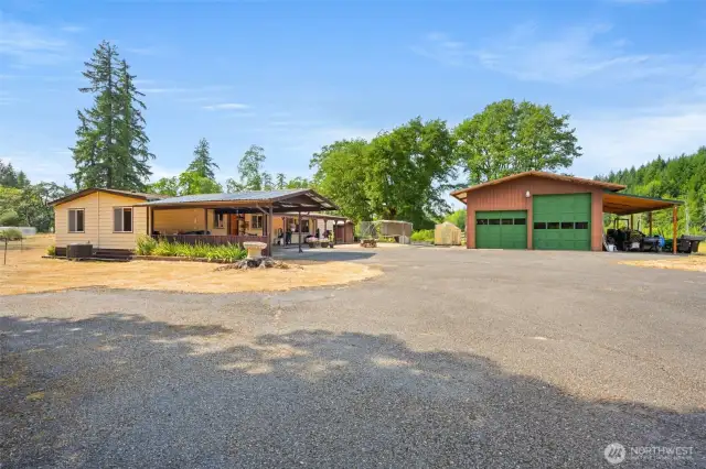 Plenty of parking and turn around areas.  Tractor and brush hog included with full price offer.