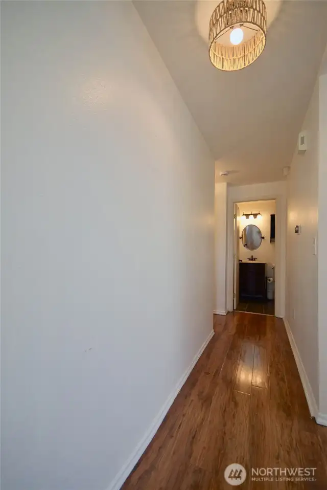 Hallway to guest bath and bedrooms