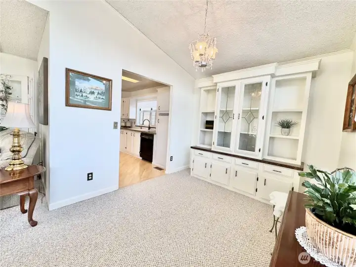 Space can be used as a dining room or family room.