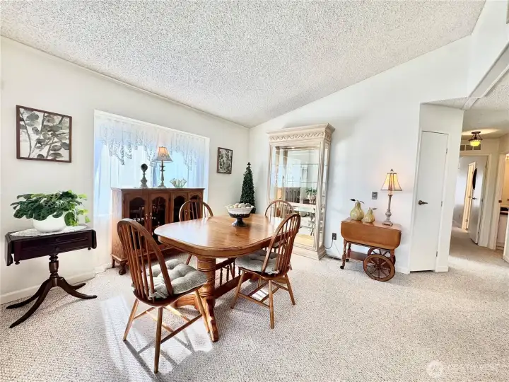 Space can be used as a dining room or family room.