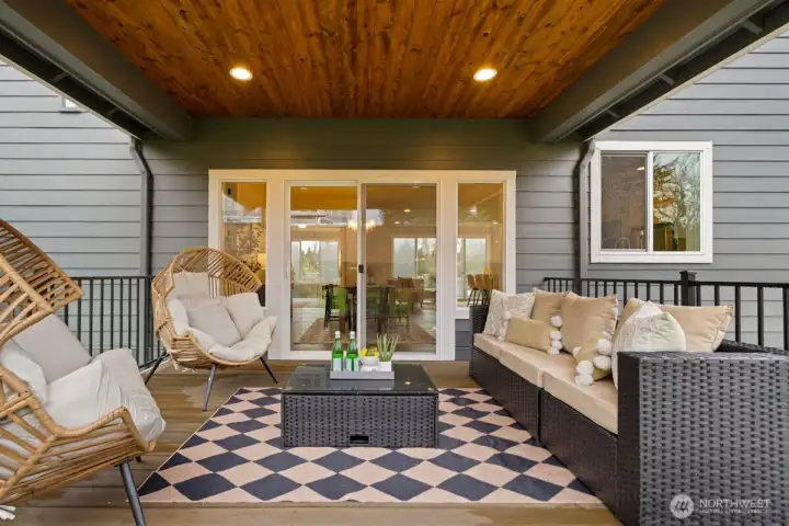 Covered deck on main level off dining.