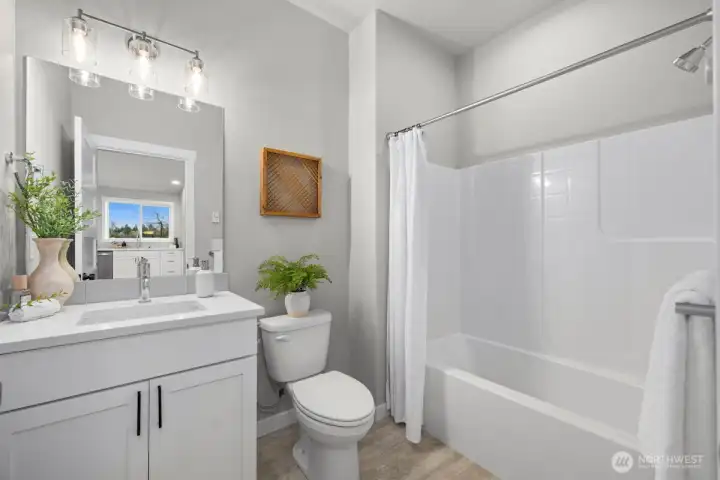Full bath in lower level studio suite/ADU.