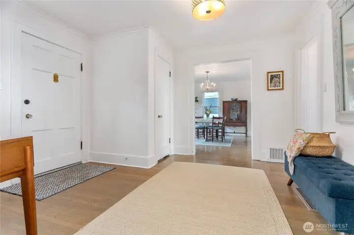 Foyer with coat closet looking towards dining room