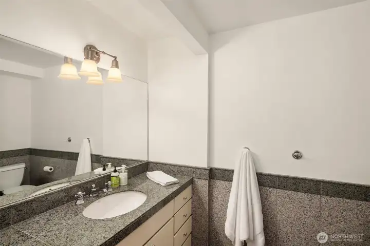 A 3/4 bathroom completes the downstairs level.