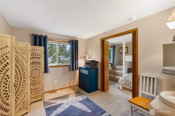 Upstairs double room bedroom. Great for office or play room.