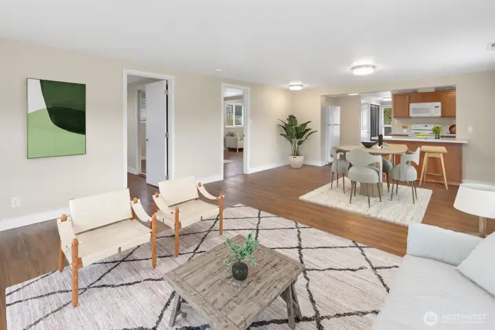 Open connection between kitchen and living area, ideal for daily living and entertaining