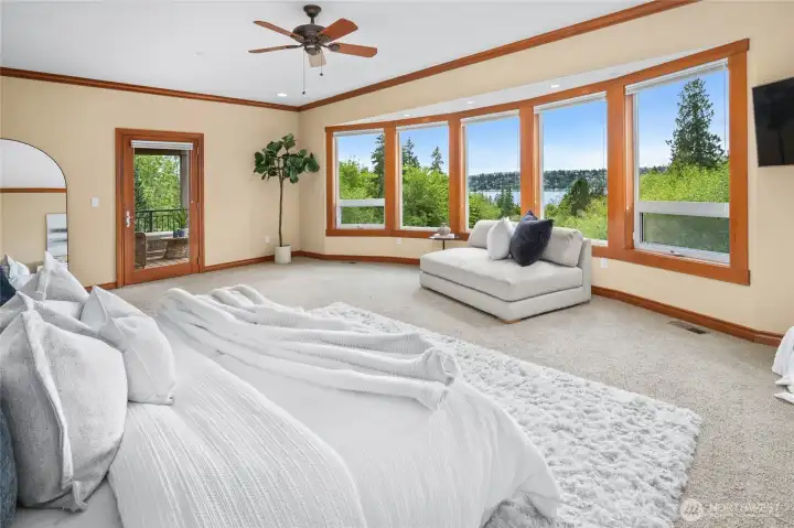 Enjoy your primary suite and balcony, peaceful and private with lovely views.