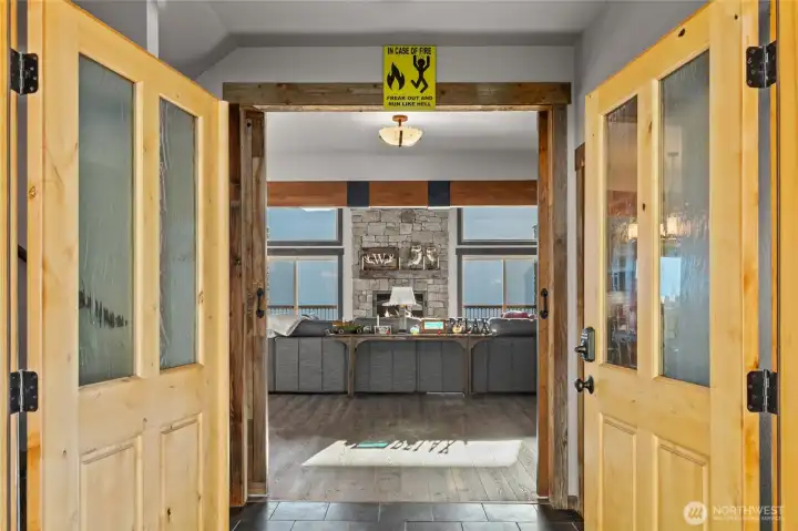 As you enter the front entry you immediately welcomed by soaring mountain and Lk Cle Elum views.