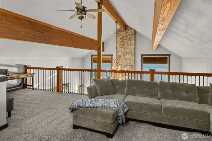 Upstairs view of the large upper floor loft. This area could be used for extra sleeping, an office or anything you would like.