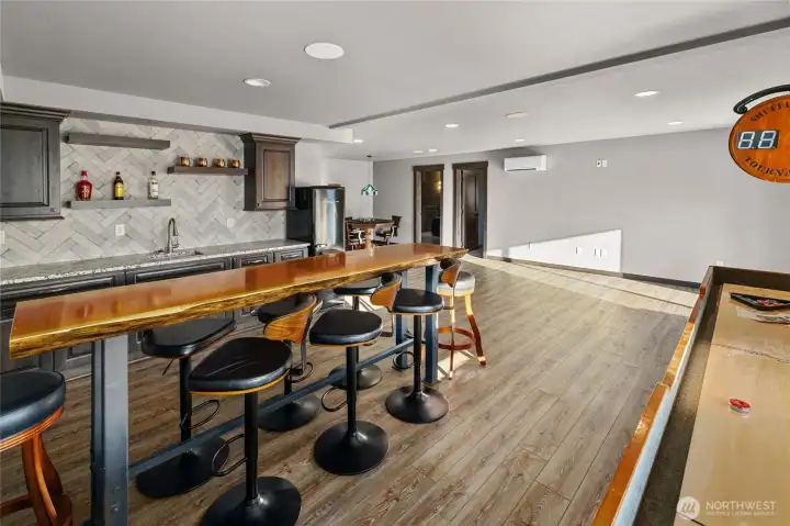 Relax at the bar while friends are playing shuffle board or staring out the window at that amazing view.
