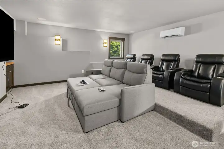 Downstairs you will also find a beautiful state of the art home theater room. Anybody want to watch a movie tonight after dinner in full surround sound?