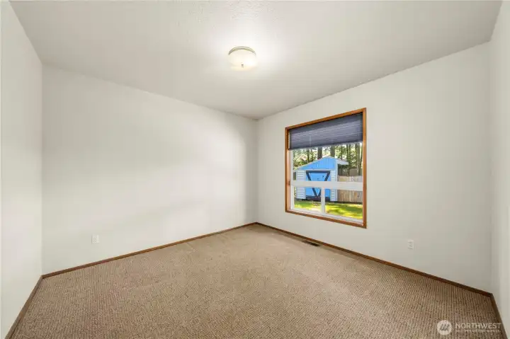 Private office space overlooking the backyard, perfect for working from home
