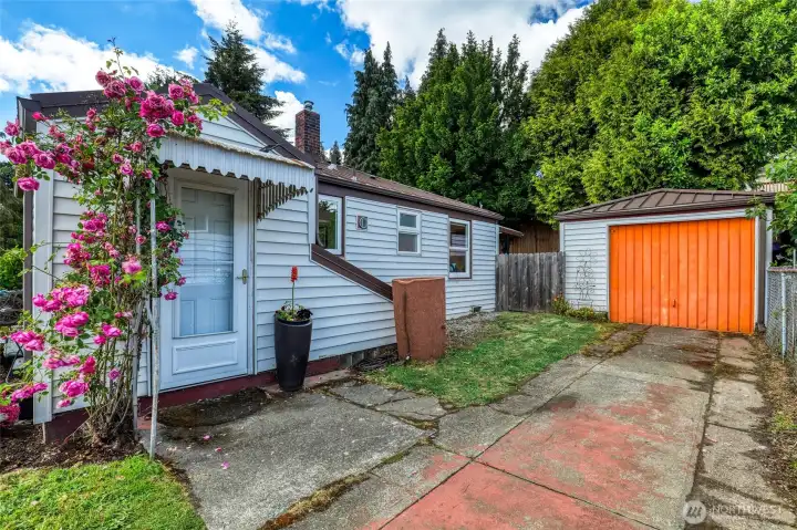 side door for convenient access to kitchen or private entry to downstairs.