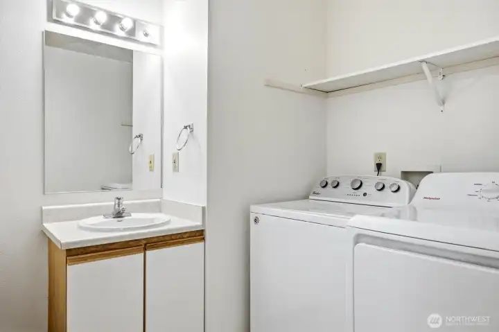 1/2 Bath main floor with laundry. 1/2 Bath main floor with laundry.